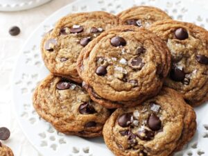 Chewy on the inside and crispy around the edges, these easy coconut oil espresso chocolate chip cookies are impossible to resist! And no mixer required! Filled with dark chocolate chips, melted coconut oil and a touch of espresso powder! Excellent for the holidays or any day of the week!