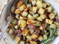 Crispy, creamy roasted red potatoes! This simple side is a perfect addition to any meal! With garlic, rosemary and thyme!