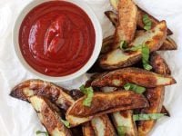 Crispy on the outside and creamy on the inside, these oven baked fries are completely addicting! A perfect side dish for all your favorites!
