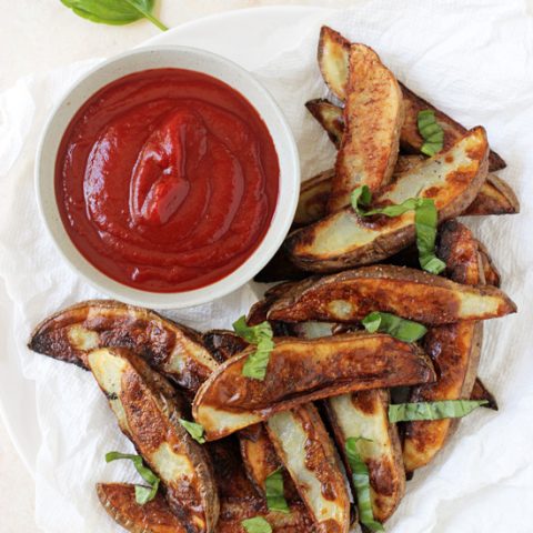 Crispy on the outside and creamy on the inside, these oven baked fries are completely addicting! A perfect side dish for all your favorites!