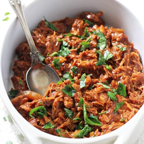This super easy crockpot pulled BBQ chicken is a family favorite! Perfect for a crowd or for plenty of leftovers! Let your slow cooker do all the work for this healthy meal!