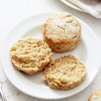 Perfectly soft and tender dairy free biscuits! Made with coconut oil, coconut milk and a touch of honey! Easy, quick and delicious, they are perfect for breakfast or as a side! Vegan option included! 