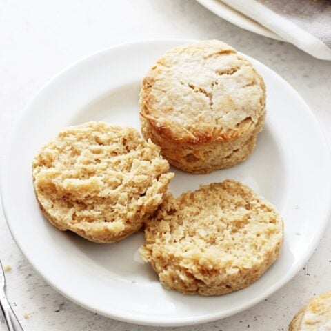Perfectly soft and tender dairy free biscuits! Made with coconut oil, coconut milk and a touch of honey! Easy, quick and delicious, they are perfect for breakfast or as a side! Vegan option included! 