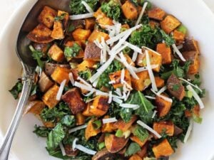 This roasted sweet potato salad is simple to make and packed with flavor! With toasted walnuts, kale, and a maple lime dressing!