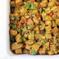 This classic thanksgiving stuffing is a staple at our holiday table! Filled with carrots, celery, rosemary and thyme, it bakes up crisp on top and perfectly soft underneath!