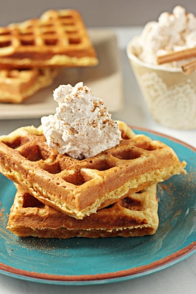 Eggnog Waffles with Cinnamon Whipped Cream - Cook Nourish Bliss