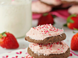 Soft chocolate sugar cookies with strawberry frosting