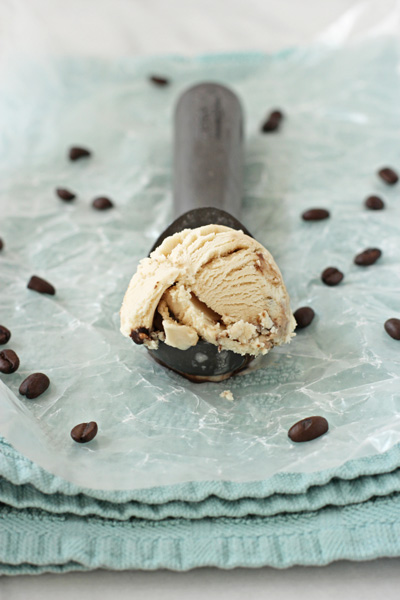 A scoop of Coffee Frozen Yogurt in an ice cream scoop.