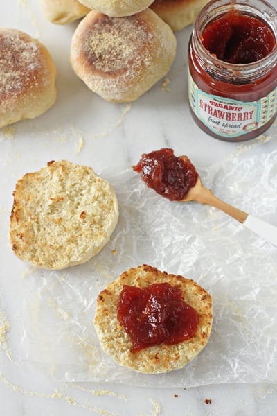A DIY English Muffin split open and smeared with jam.