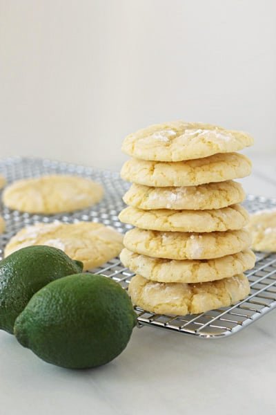 Lime Lemon Cookies stacked on a wire cooling rack.