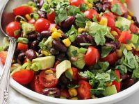 This easy and healthy mexican bean salad is fantastic for picnics and potlucks! Packed with two kinds of beans, crunchy veggies, creamy avocado and a dreamy lime chipotle dressing. Gluten and dairy free, with a vegan option included!