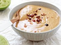 Just 15 minutes to this simple homemade peanut sauce! Filled with peanut butter, coconut milk, lime juice and fresh ginger! So flavorful & so much better than the stuff from the store!