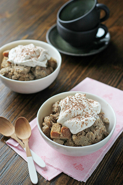 Two bowls filled with Crockpot Tiramisu Bread Pudding.