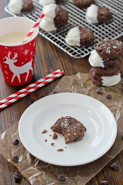 A Chocolate Cream Cheese Cookie on a plate with a bite taken out.