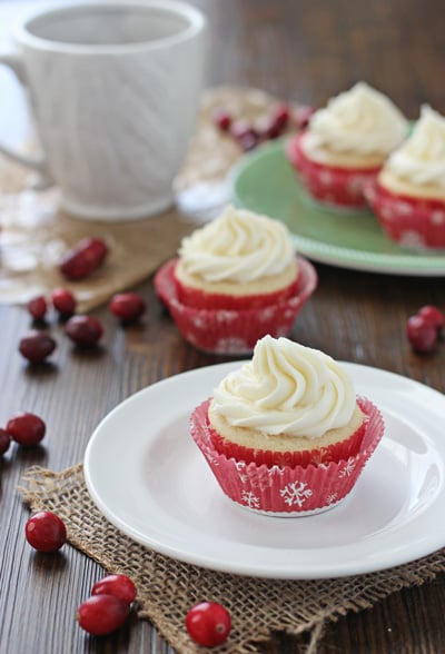 Several Cranberry Cupcakes on plates.