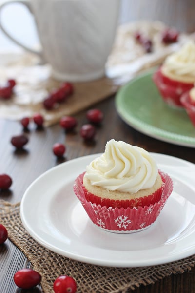 A Cranberry Cupcake on a white plate.
