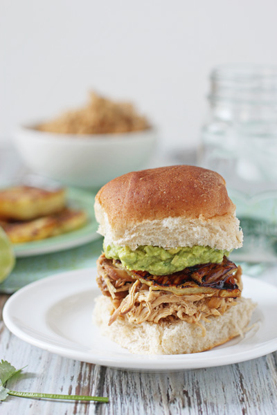 Slow Cooker Pineapple Chicken on a slider roll with guac.