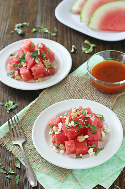 Two plates filled with Spicy Watermelon Salad.