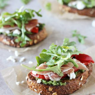 Arugula, Prosciutto & Goat Cheese Open-Faced Sandwich | A quick and easy dinner or fantastic brunch option for entertaining! With a homemade arugula pesto!