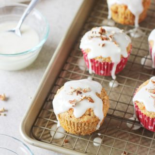 Carrot Cake Muffins with Mascarpone Glaze | Soft, tender muffins filled with carrots and finished with a creamy mascarpone topping! Perfect for Spring!