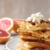 Recipe for grapefruit buttermilk waffles topped with toasted coconut. Freezer-friendly and perfect for spring!