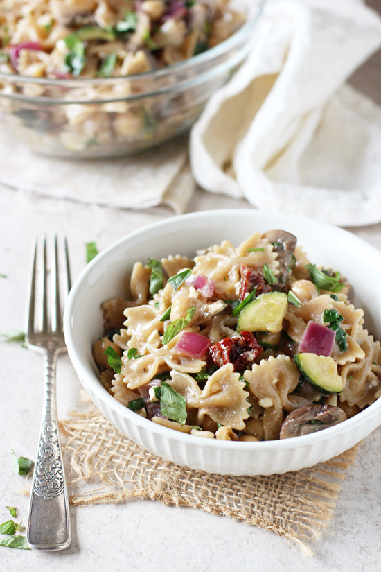 Two bowls filled with Mediterranean Farfalle Pasta Salad.