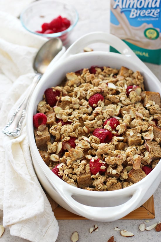 A white baking dish filled with Raspberry French Toast Bake.