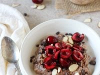 Recipe for easy and healthy chocolate covered cherry overnight oats. This make-ahead breakfast tastes like dessert and features lots of fresh cherries!