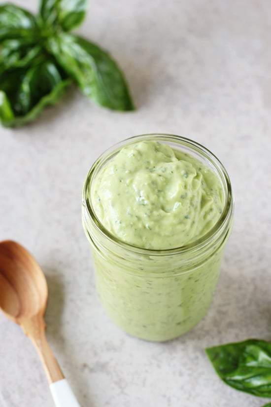 A ball jar filled with lightened up green goddess dressing.