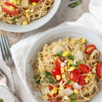 Recipe for light and summery brown butter tomato and corn angel hair pasta. With fresh corn, tomatoes, parmesan and lemon zest!
