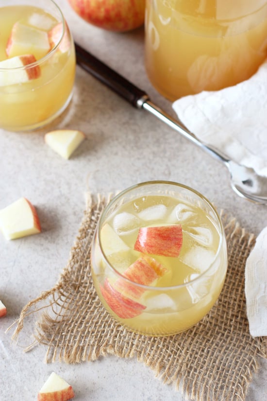 Two glasses filled with Apple Spritzers.