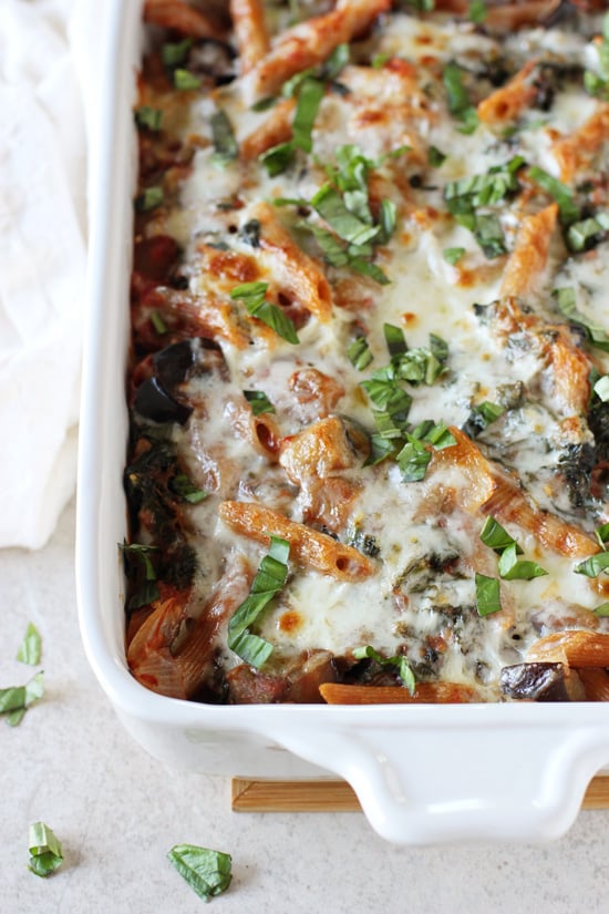A white baking dish filled with Eggplant Baked Ziti.
