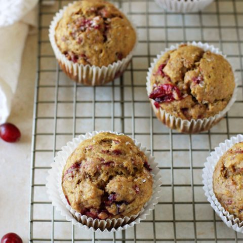 A simple, easy recipe for leftover cranberry sauce pumpkin muffins. Light, fluffy and filled with whole wheat flour, natural sweeteners and plenty of cranberry sauce from Thanksgiving!
