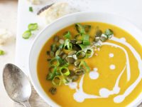 A simple, creamy and flavorful recipe for butternut squash soup! With thai-inspired flavors like ginger, coconut milk and roasted garlic!