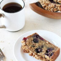 Lightly sweet and moist blueberry banana bread with oat crumble! Filled with whole wheat flour, maple syrup and plenty of blueberries!