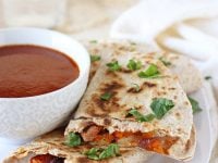 Plenty of veggies, spices, black beans and of course cheese make these roasted vegetable quesadillas a weeknight staple! A simple vegetarian recipe that can double as an appetizer!