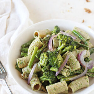 Just 35 minutes to get this easy spring green pesto pasta on the table! With a flavorful kale spinach pesto, whole wheat pasta and roasted asparagus and broccoli!