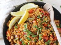 A simple, stovetop recipe for vegetable paella! A vegetarian take on this classic Spanish dish! On the table in under one hour!