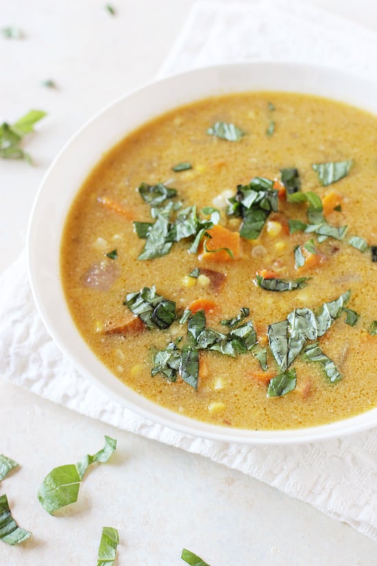 A large white bowl filled with Sweet Potato Chowder.