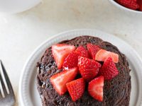Light, fluffy and nutritious chocolate buckwheat pancakes! Top with fresh strawberries for a perfect pairing! Dairy free & gluten free!