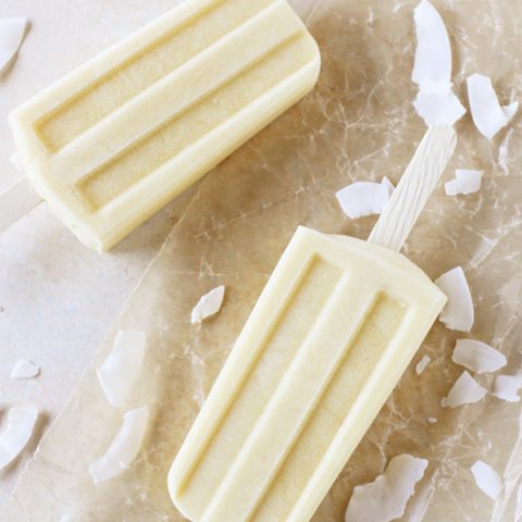 Simple and healthy creamy mango coconut ice pops! With just five ingredients, including fresh mango and coconut cream! Vegan & gluten free!