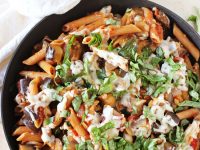 One-pot eggplant parmesan pasta skillet! All the flavors of the classic dish in a simple, everyday recipe! Packed with eggplant, whole wheat pasta and fresh basil!