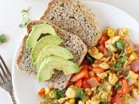 This 20-minute, healthy southwest egg scramble is a simple breakfast or dinner! Filled with bell pepper, fresh corn and plenty of spices!