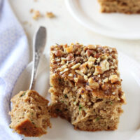 Moist and fluffy honey cinnamon zucchini bread! With whole wheat flour, applesauce and walnuts! Perfect for breakfast, snacking or even dessert!