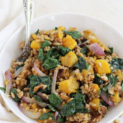 Filled with tender butternut squash, kale and crunchy walnuts, this fall farro salad is perfect for the season! Healthy, simple and an excellent main or side dish!