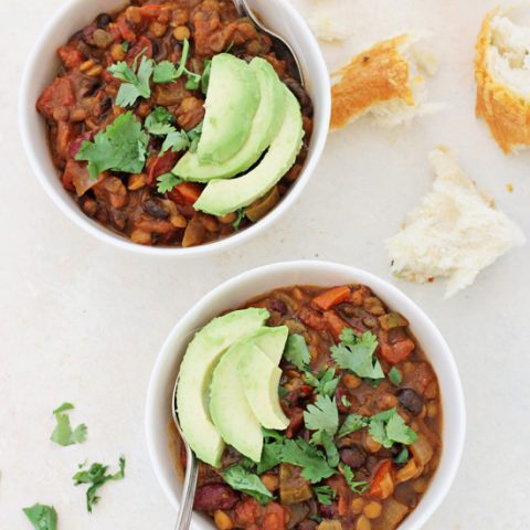 Hearty and healthy, vegetarian pumpkin lentil chili! Filled with warm spices, lentils, beans and veggies! Freezer-friendly and wonderfully cozy!