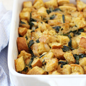 Cozy caramelized onion and spinach stuffing! With sourdough bread and oh-so-flavorful caramelized onions. A fun twist on classic stuffing for the holidays!