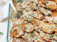 A healthier sweet potato gratin! Made with almond milk, shallots, cilantro and parmesan cheese! Comfy, cozy and no heavy cream in sight!