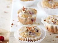 Soft and fluffy cranberry orange eggnog muffins! With whole wheat flour and sweetened with honey and maple syrup! Perfect for the season!