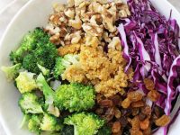 A colorful, healthy and oh so crunchy broccoli quinoa salad! With a creamy dressing and juicy golden raisins, this make-ahead dish is sure to please!